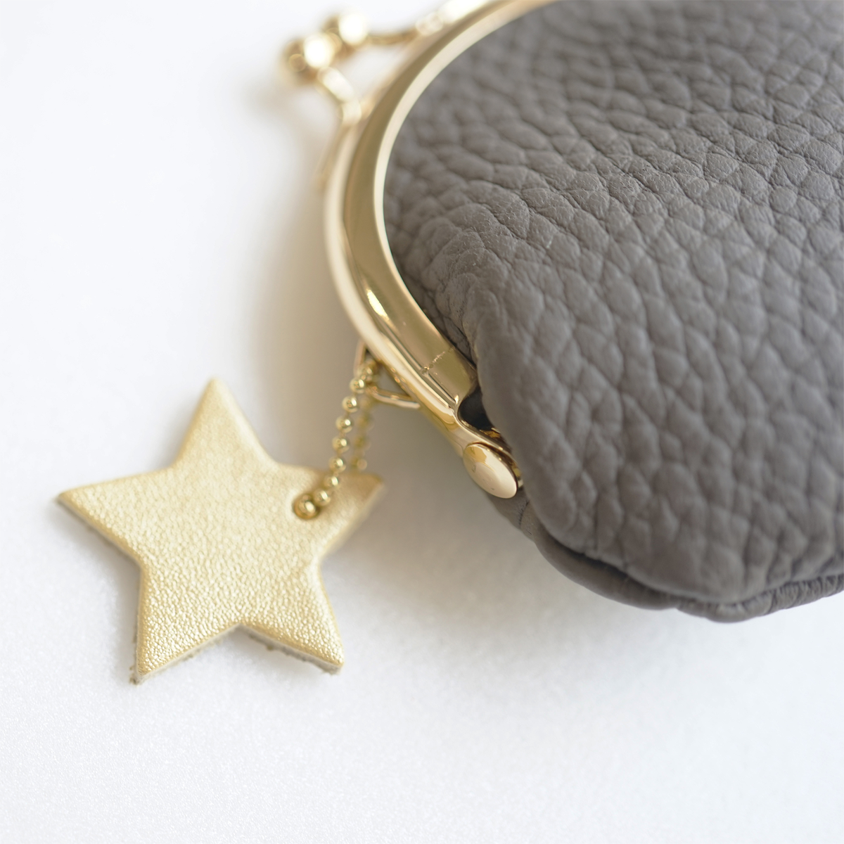 hoshinooto/本革 mini がま口財布 [Gemini-ジェミニ]　星チャームアップ